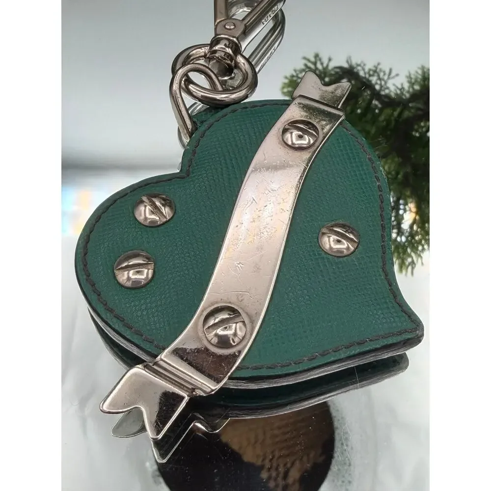 Prada studded heart keychain made of green saffiano leather